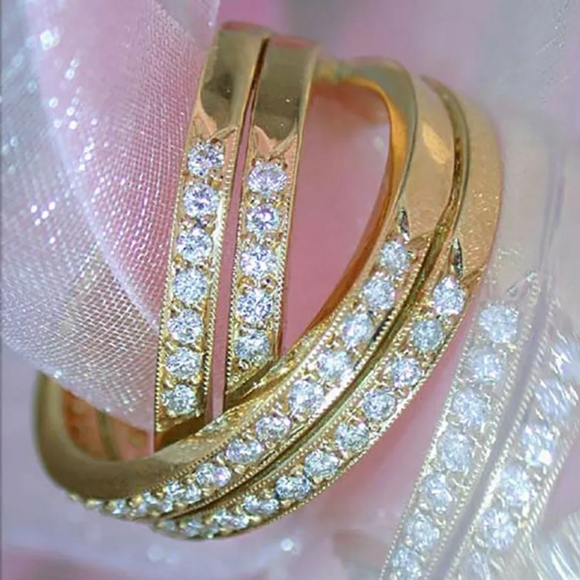 Yellow Gold/White Sapphire Infinity crossover ring. - Picture 7 of 10